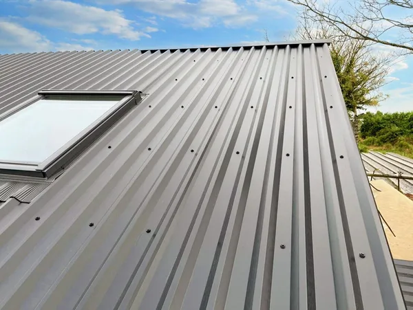 Profiled metal roof with a rooflight