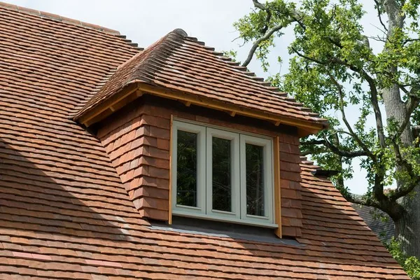 Tiled dormer roof with a window