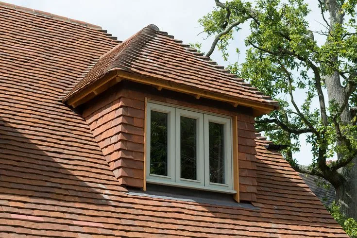 Tiled dormer roof with a window